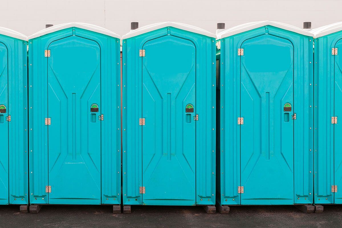 Industrial portable restroom units at a plant in Farmington, New Mexico